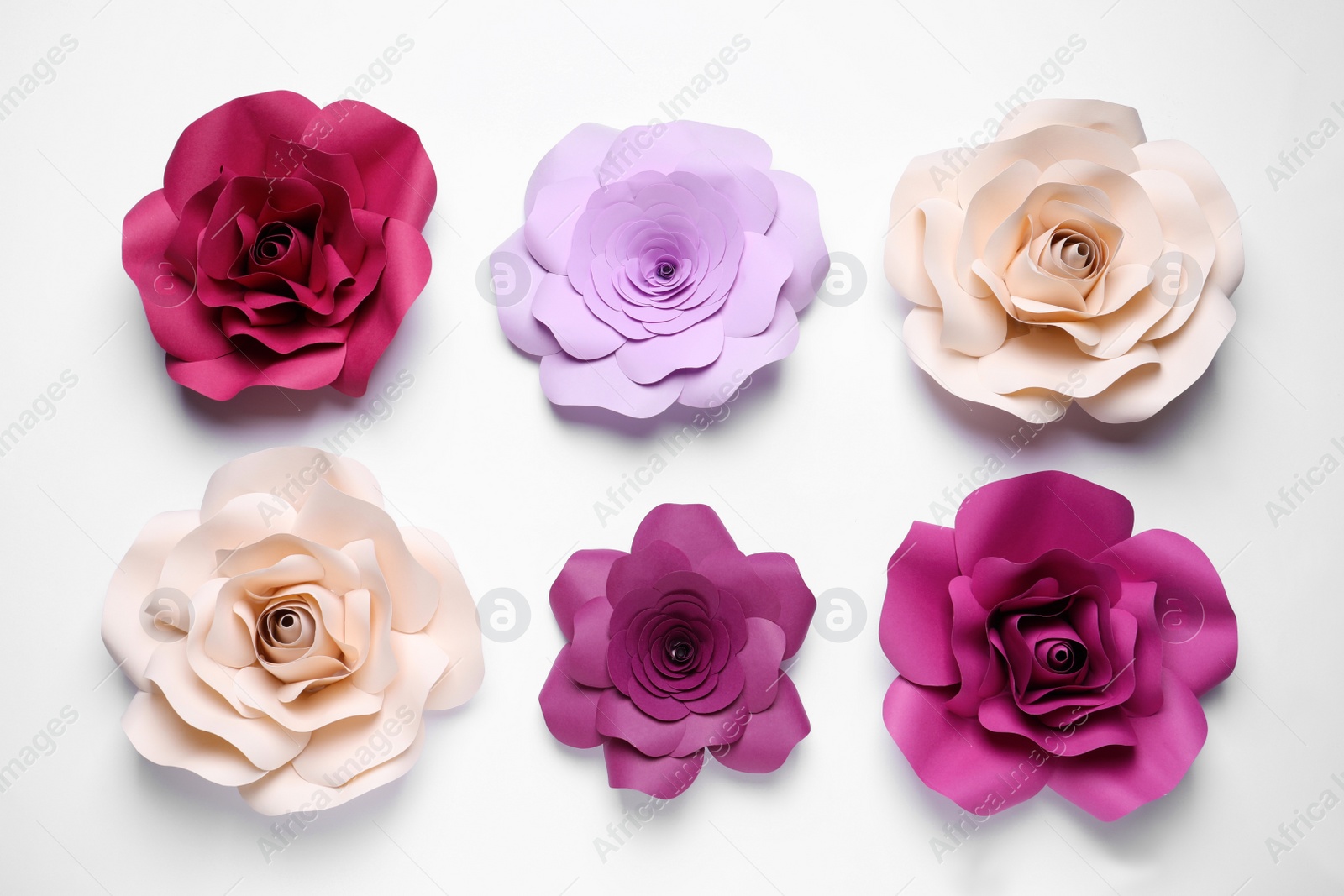 Photo of Different beautiful flowers made of paper on white background, top view