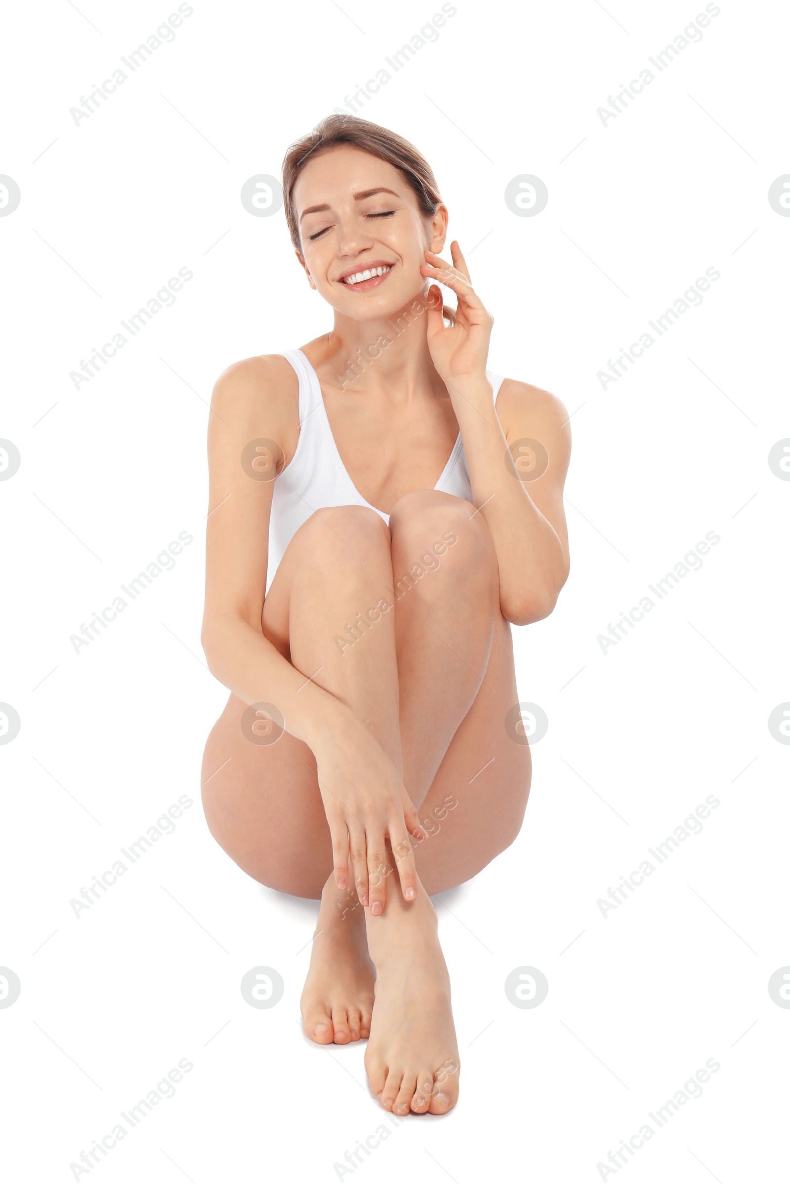 Photo of Portrait of young woman with perfect smooth skin on white background. Beauty and body care