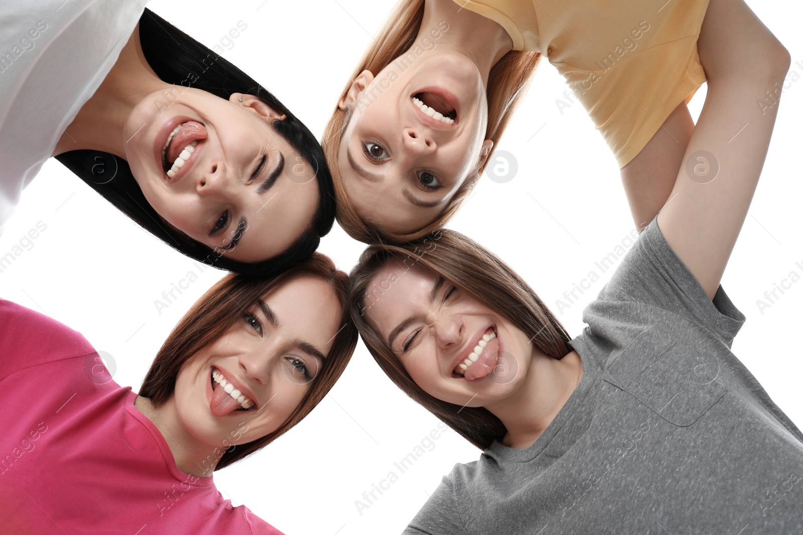 Photo of Beautiful young ladies hugging on white background, bottom view. Women's Day