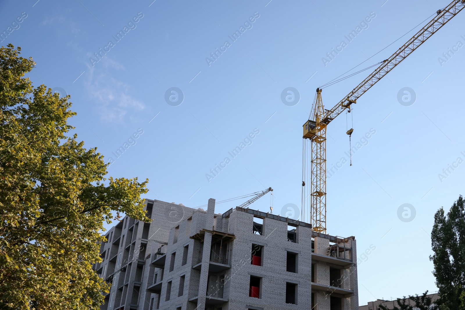 Photo of View of unfinished building against blue sky