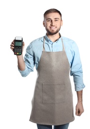 Young seller holding payment terminal isolated on white