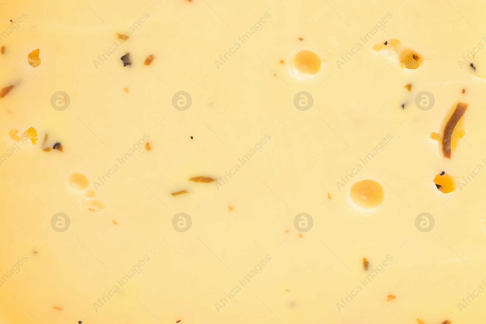 Photo of Delicious truffle cheese as background, closeup view