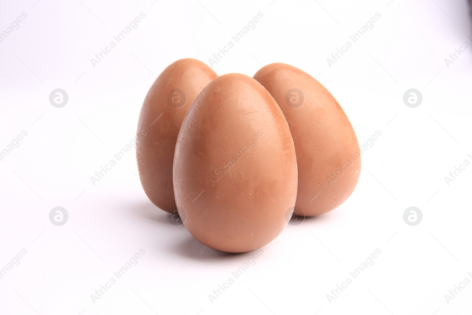 Photo of Sveti Vlas, Bulgaria - June 27, 2023: Unwrapped Kinder Surprise Eggs isolated on white