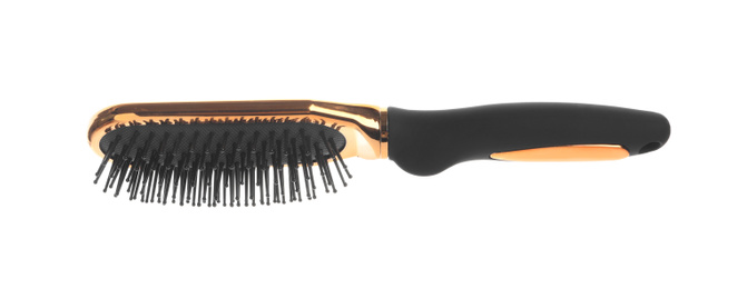 Photo of New modern hair brush isolated on white