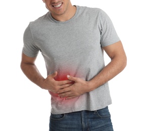 Photo of Man suffering from liver pain on white background, closeup