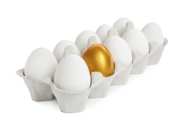 Photo of Carton with golden egg and ordinary ones on white background