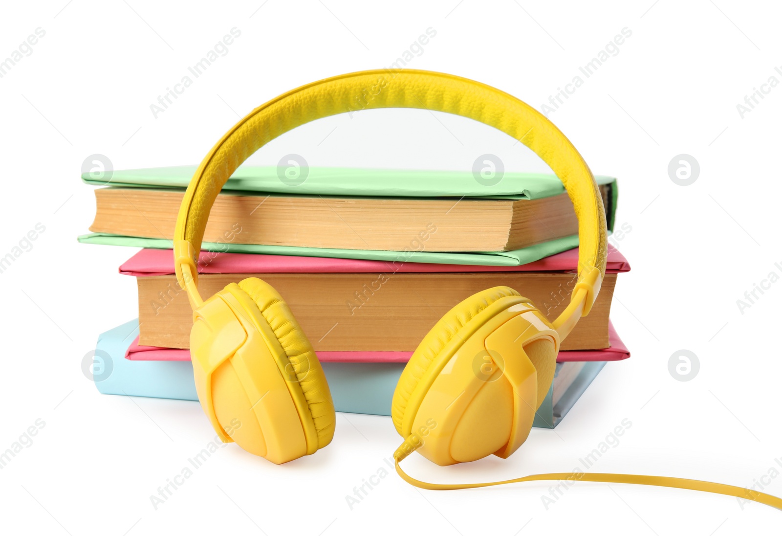 Photo of Books and modern headphones isolated on white