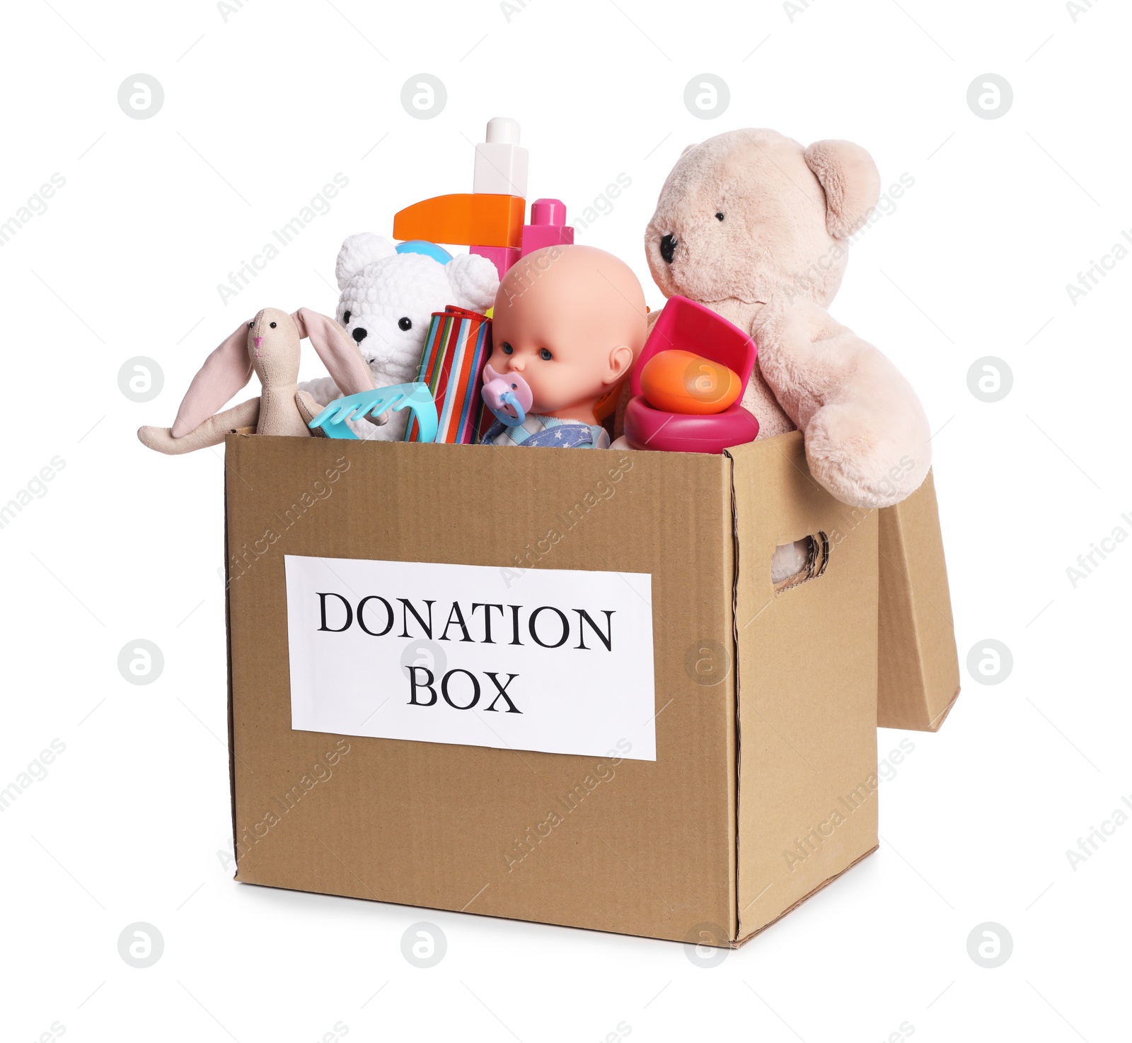 Photo of Donation box full of different toys isolated on white