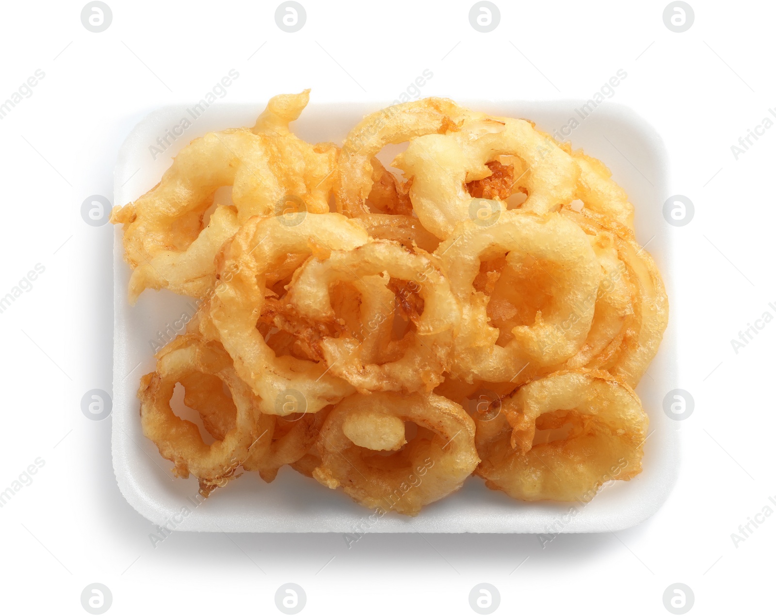Photo of Plate with delicious golden breaded and deep fried crispy onion rings on white background, top view