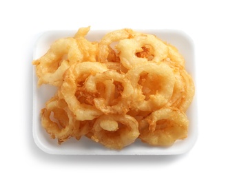 Plate with delicious golden breaded and deep fried crispy onion rings on white background, top view