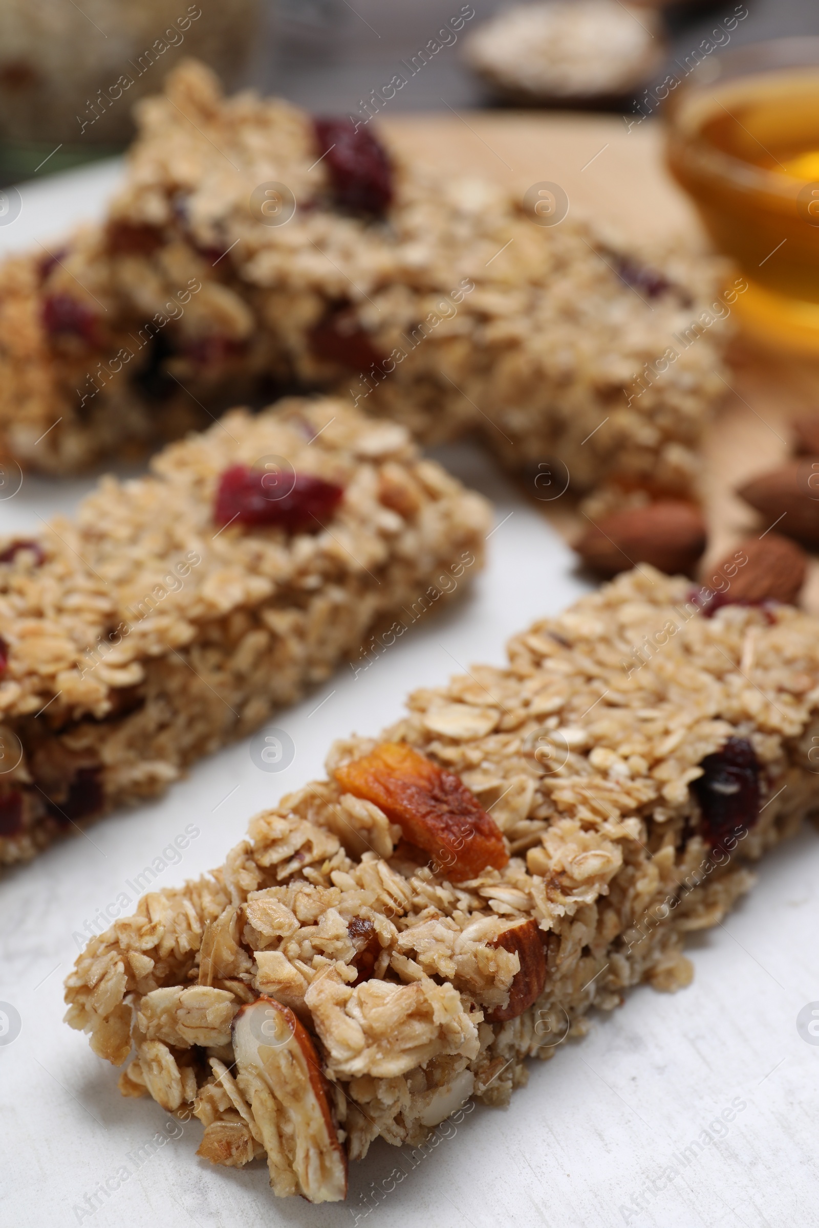 Photo of Tasty granola bars on board, closeup view