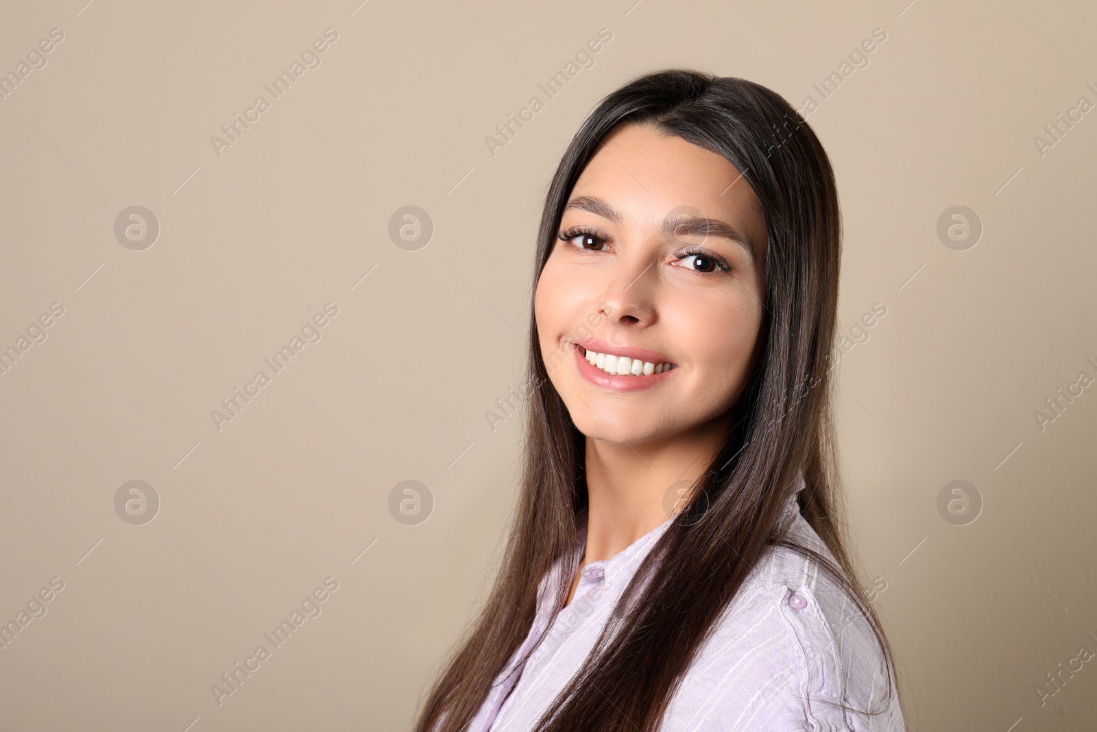 Photo of Young woman with healthy teeth on color background. Space for text