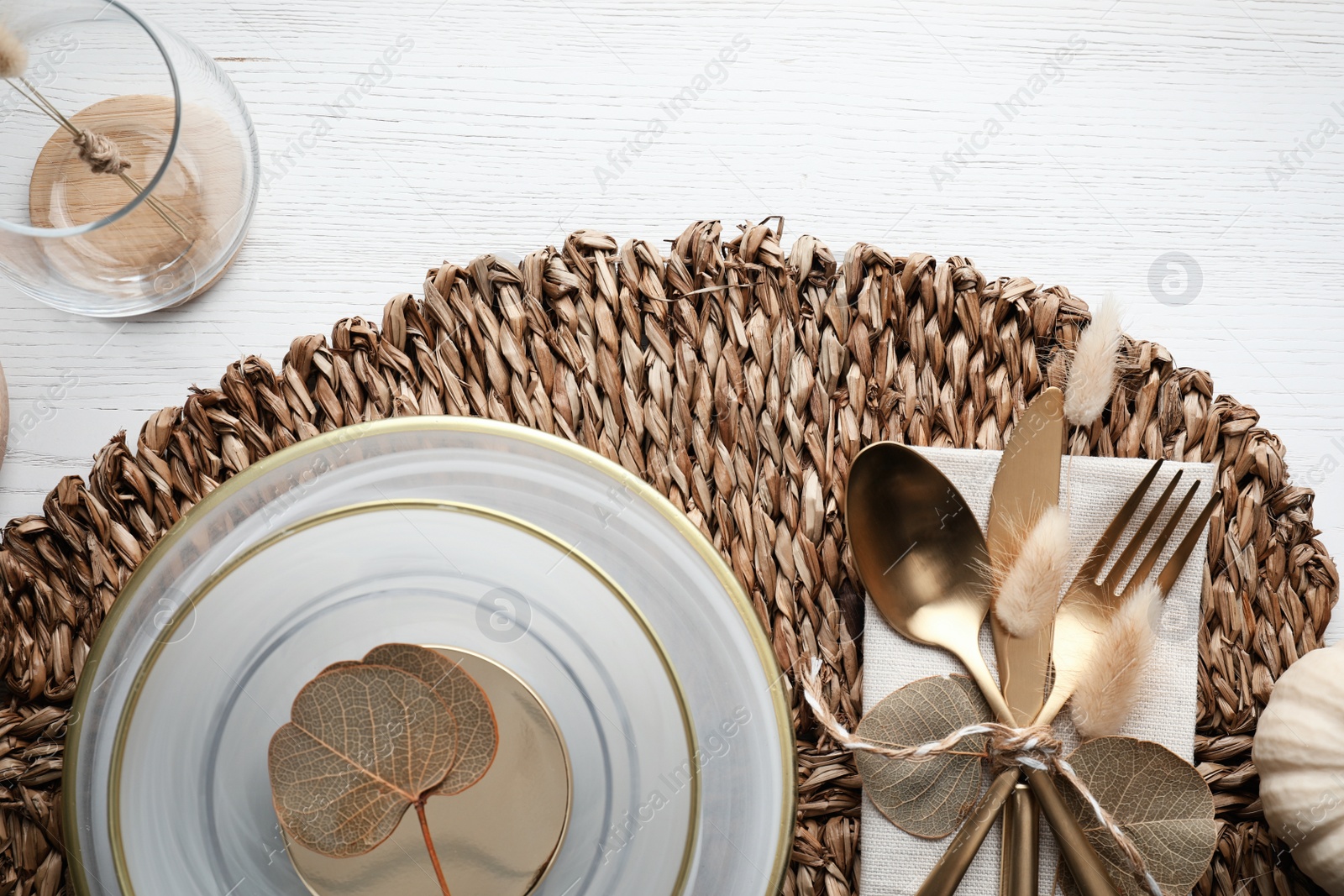 Photo of Autumn table setting with pumpkin on white wooden background, flat lay