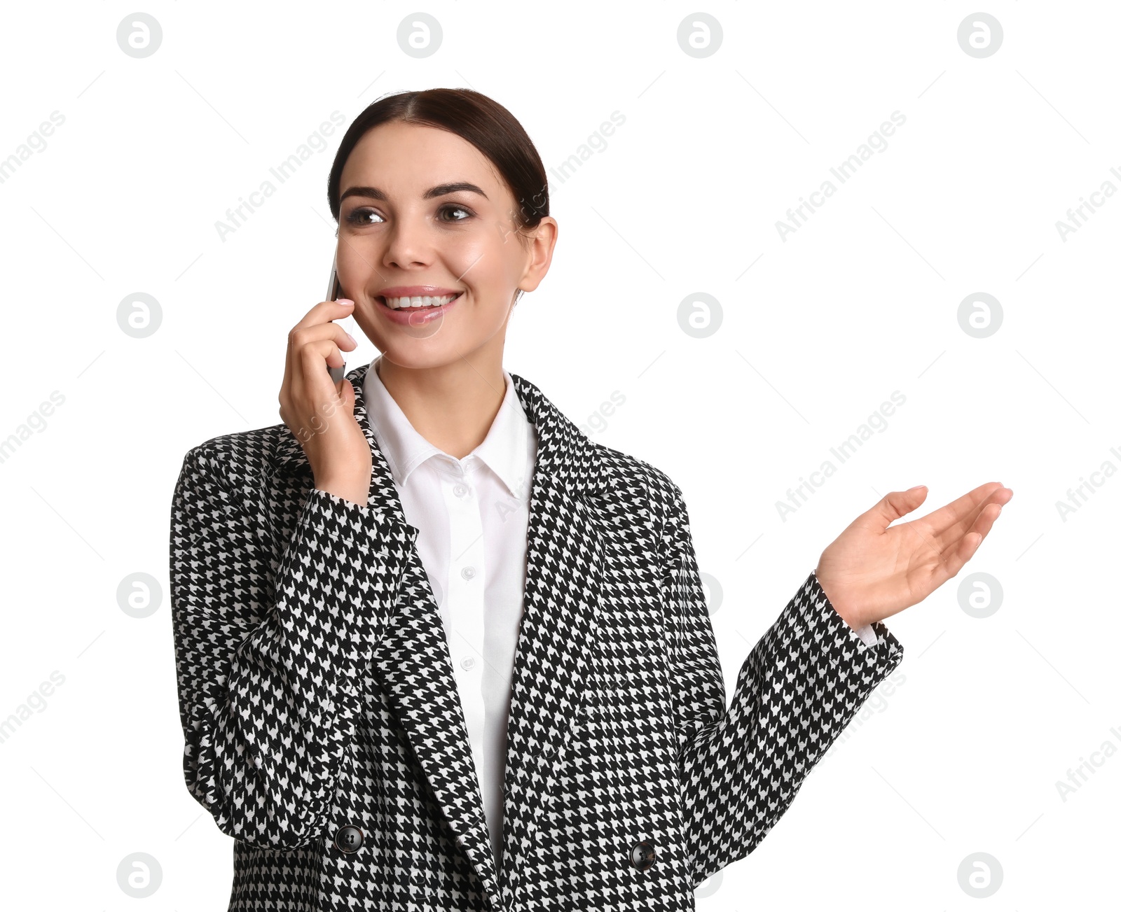 Photo of Young businesswoman talking on mobile phone against white background