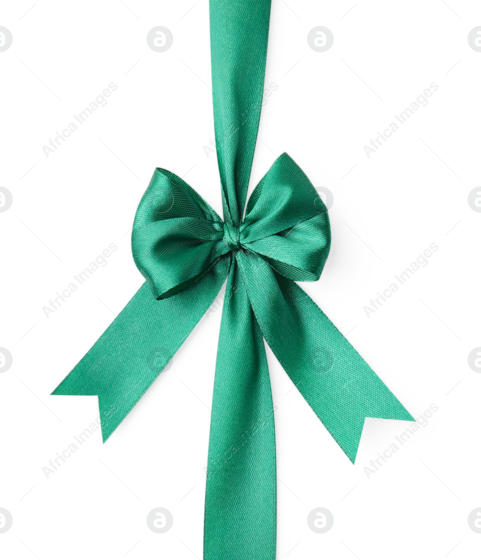 Photo of Green satin ribbon with bow isolated on white, top view