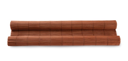 Photo of Rolled sushi mat made of bamboo on white background