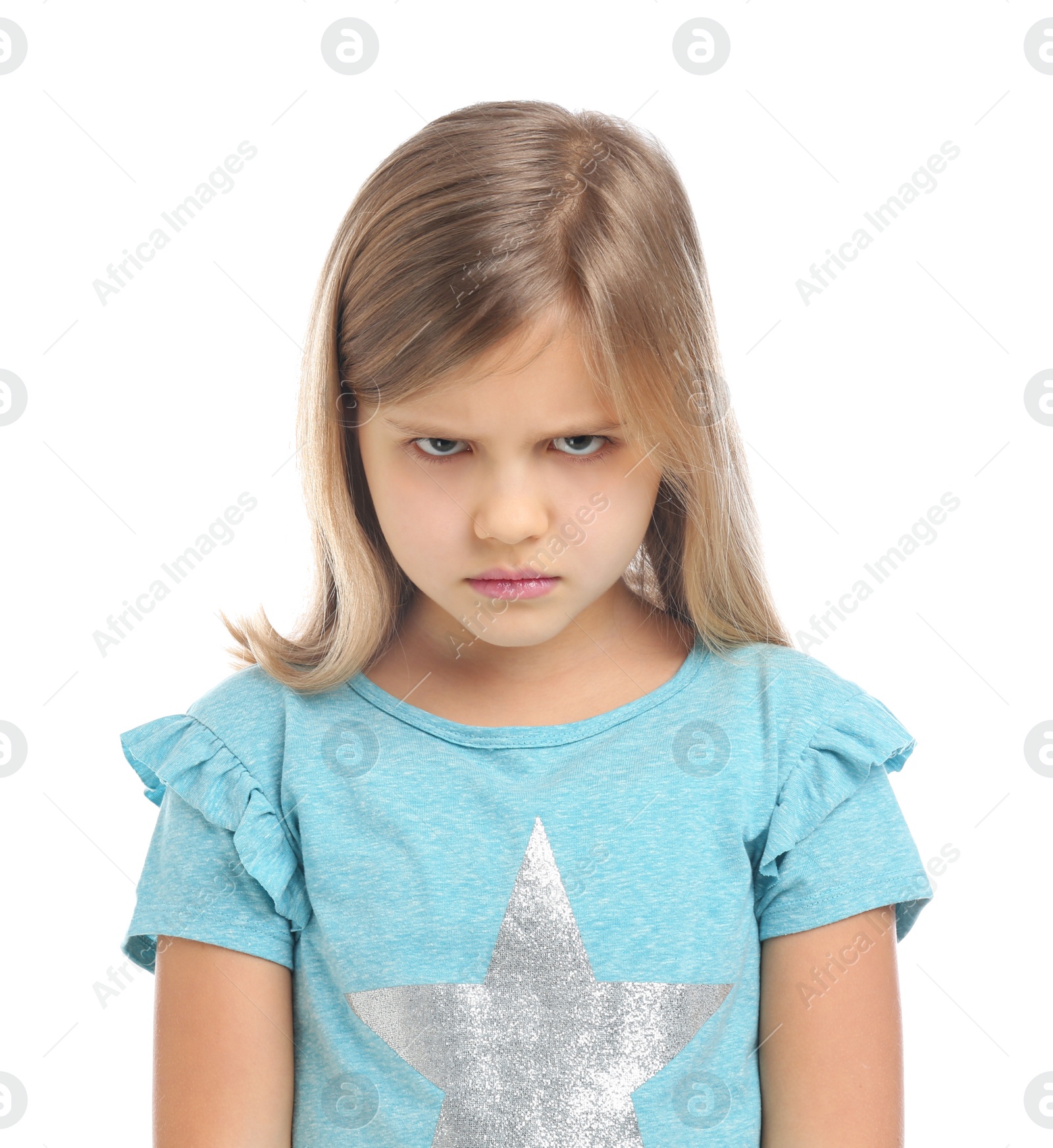 Photo of Angry little girl in casual outfit on white background