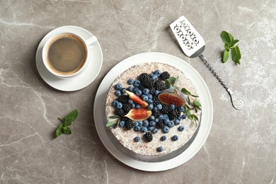 Delicious homemade cake with fresh berries served on table, top view