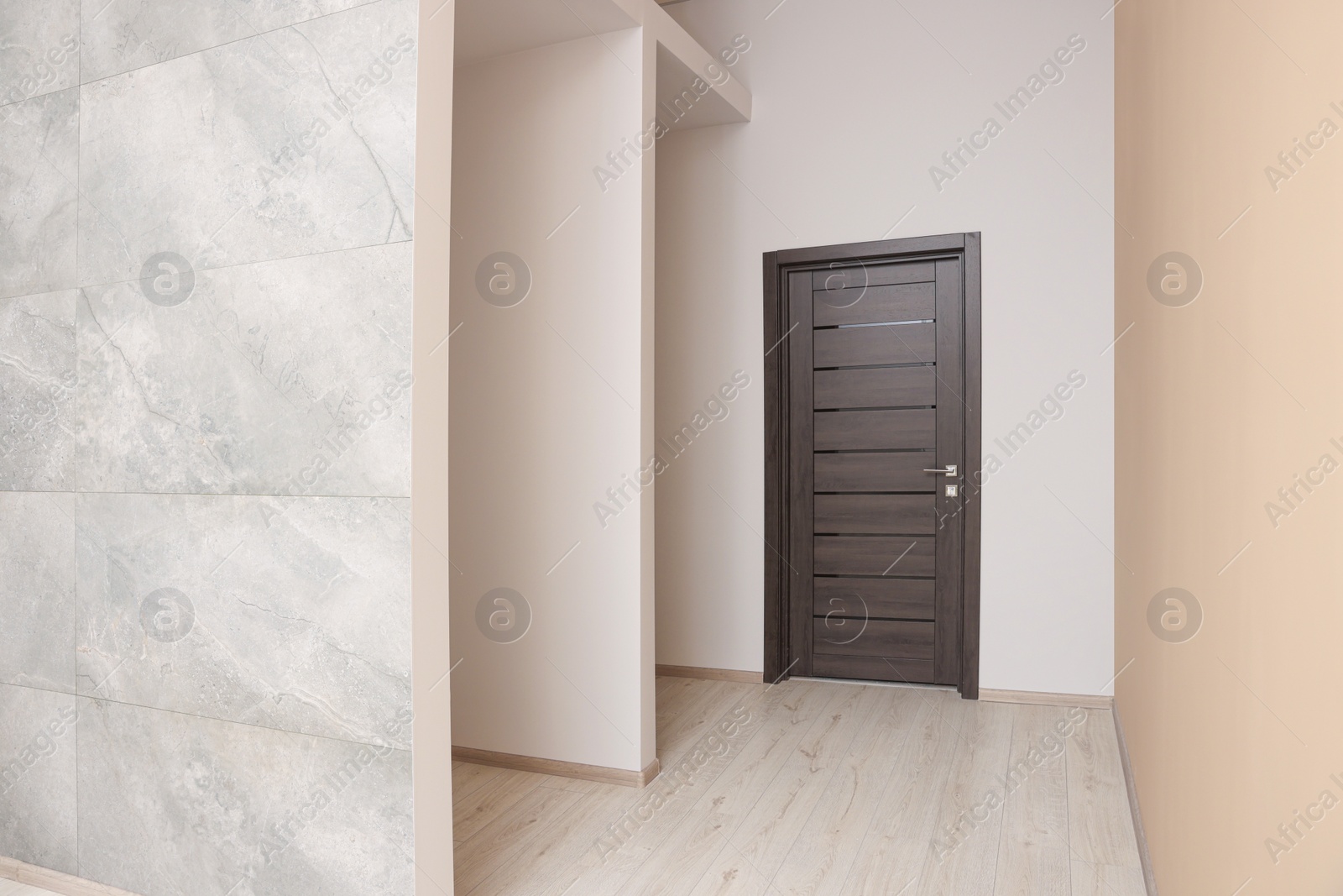 Photo of Empty office room with color walls and door. Interior design