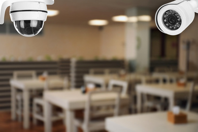 Image of Modern CCTV security cameras in school canteen. Guard equipment