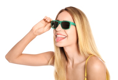 Beautiful woman in stylish sunglasses on white background
