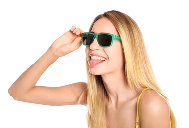 Photo of Beautiful woman in stylish sunglasses on white background