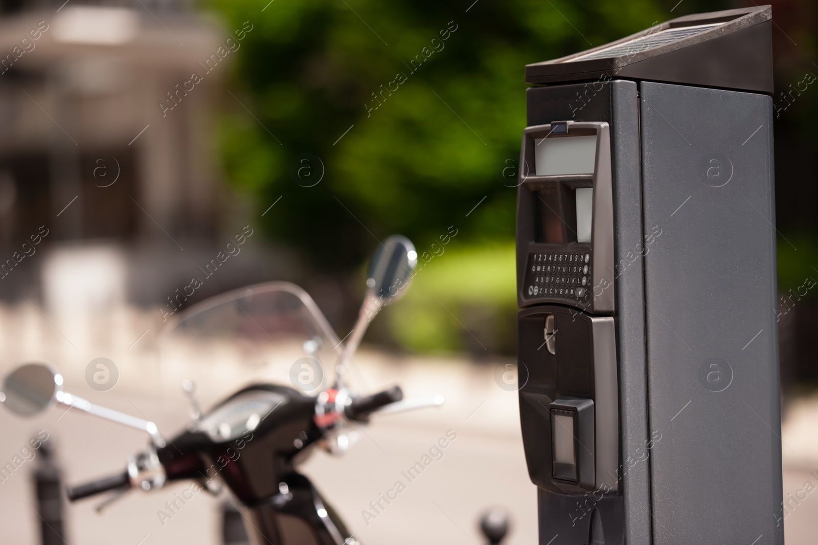 Photo of Parking meter on city street, space for text