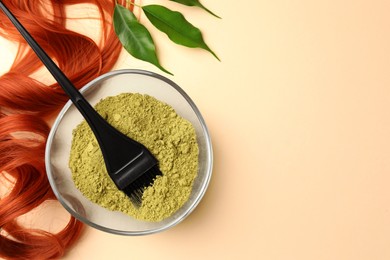 Bowl of henna powder, brush, green leaves and red strand on beige background, flat lay with space for text. Natural hair coloring