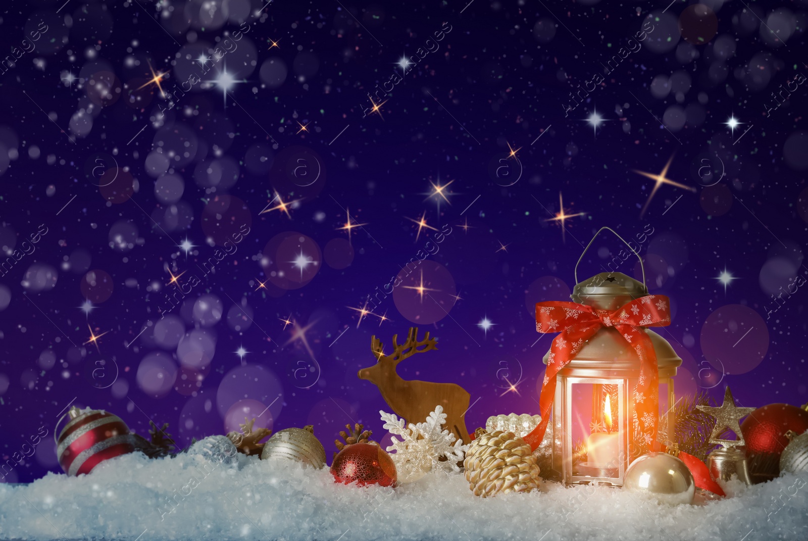 Image of Composition with Christmas lantern on snow, space for text. Magical atmosphere 