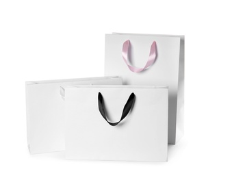 Paper shopping bags isolated on white. Mock up for design