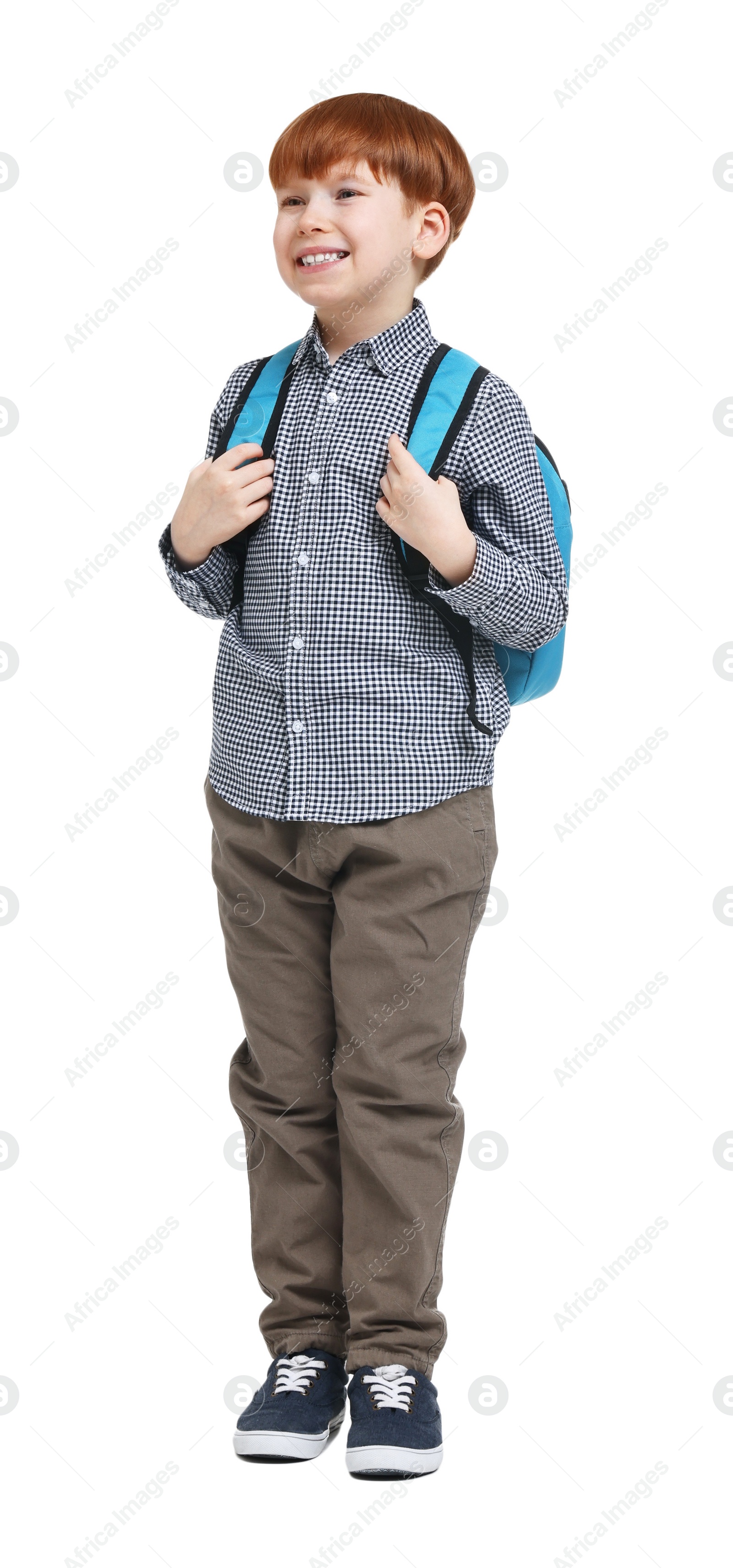 Photo of Little boy with backpack on white background