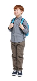 Little boy with backpack on white background