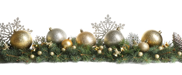 Fir tree branches with Christmas decoration on white background