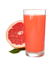 Photo of Tasty grapefruit juice in glass, fresh fruit and green leaf isolated on white