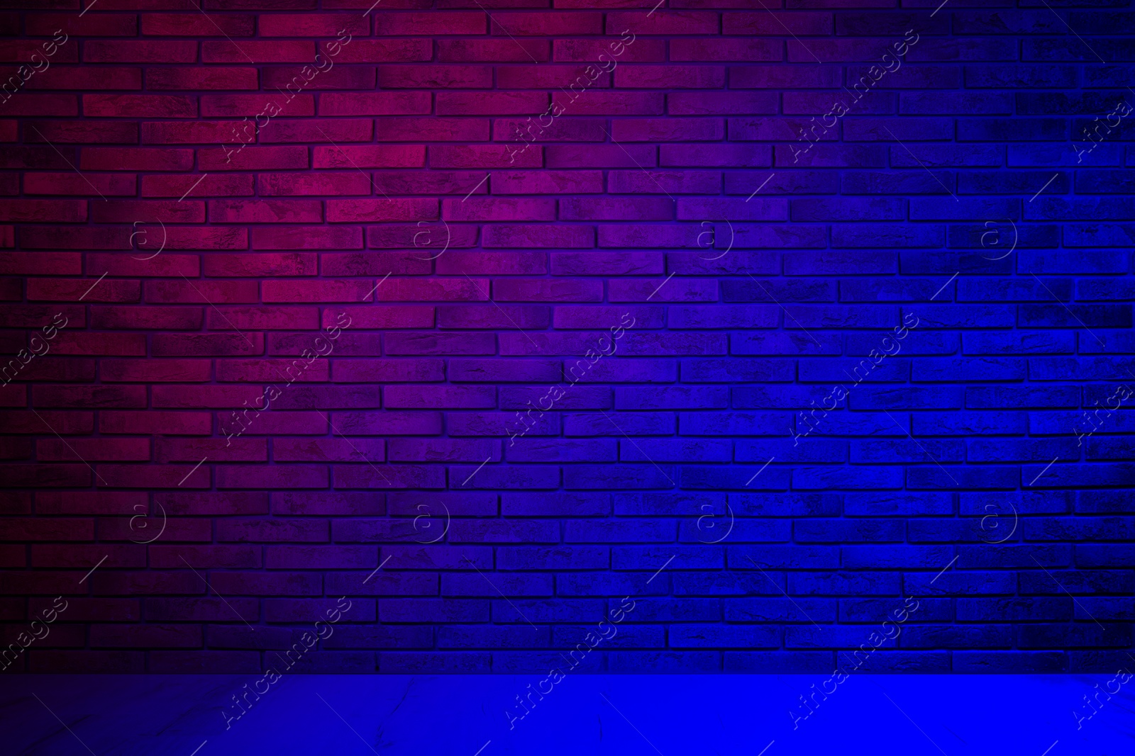 Image of Room with brick wall and wooden floor in neon lights