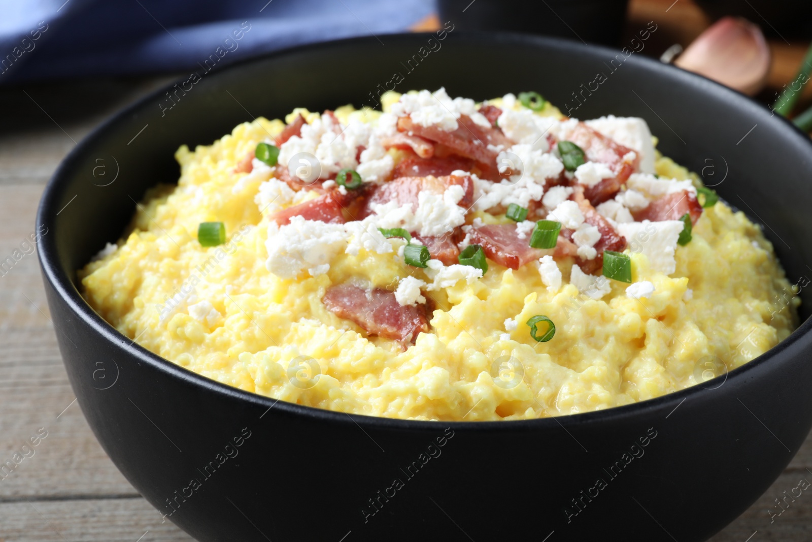 Photo of Delicious traditional banosh in bowl, closeup view