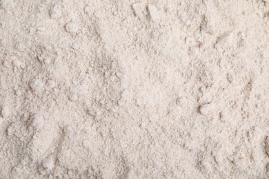 Pile of oat flour as background, top view