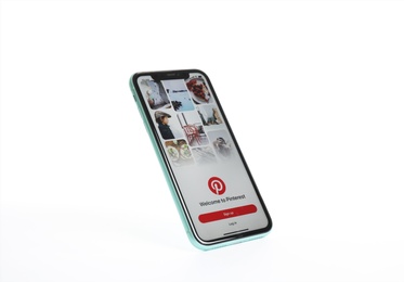 Photo of MYKOLAIV, UKRAINE - JULY 9, 2020: iPhone 11 with Pinterest app on screen against white background