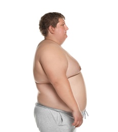 Photo of Portrait of overweight man posing on white background