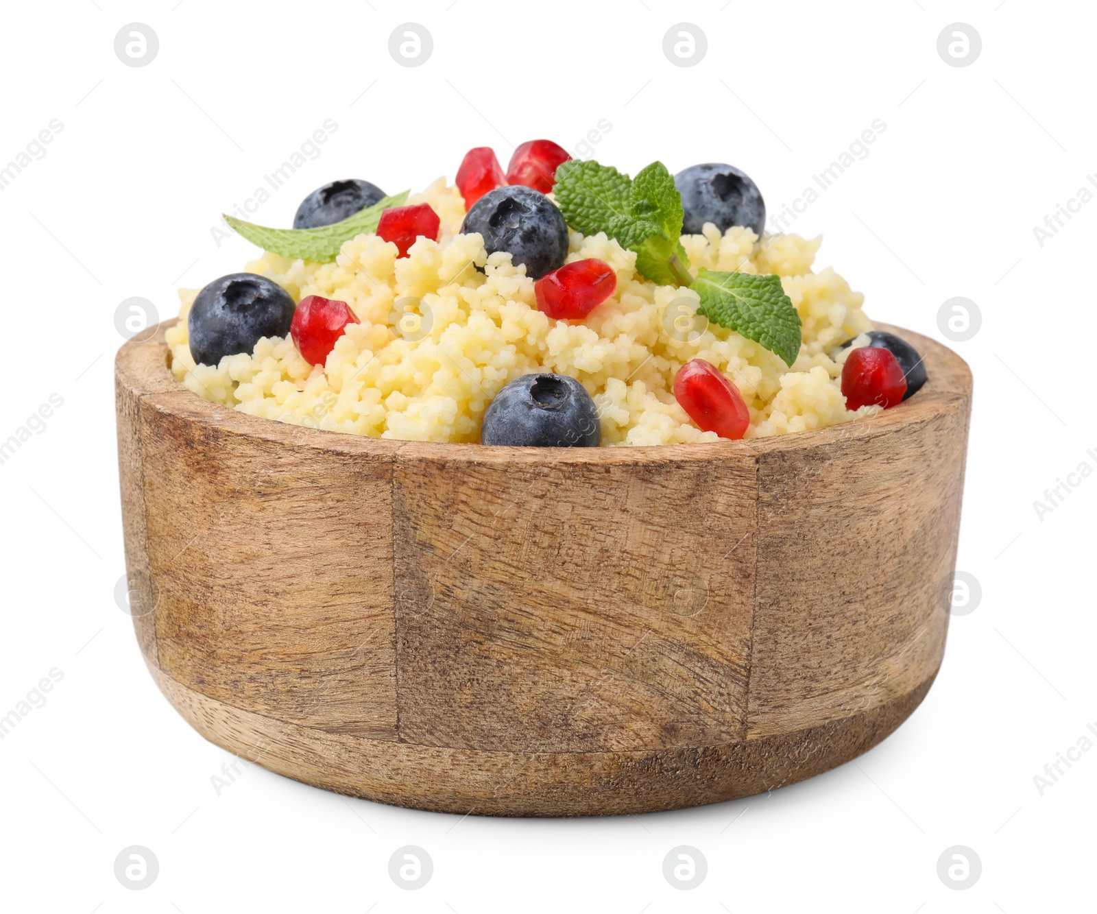 Photo of Bowl of tasty couscous with blueberries, pomegranate and mint isolated on white