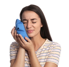 Photo of Young woman suffering from toothache on white background