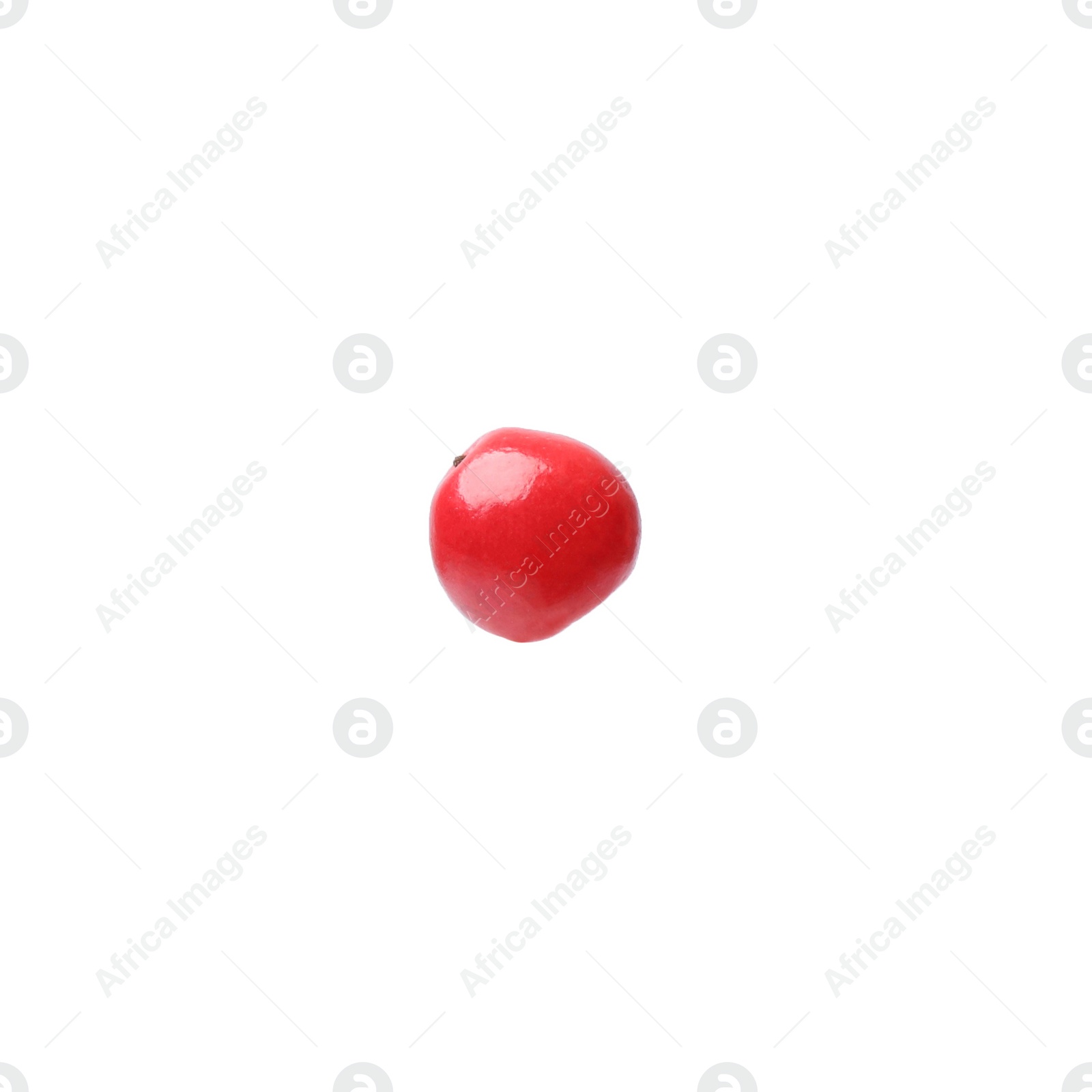 Photo of Aromatic spice. Red peppercorn isolated on white