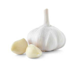 Fresh garlic bulb and cloves on white background