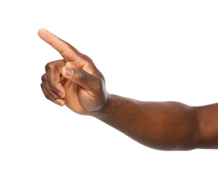 African-American man pointing at something on white background, closeup