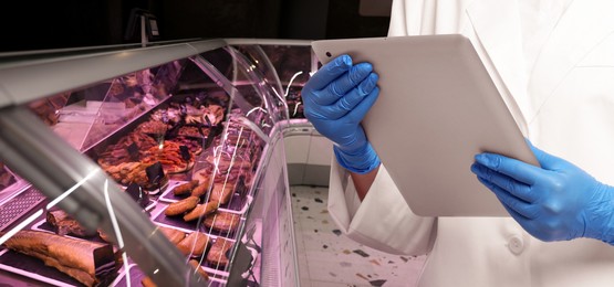 Image of Food quality control specialist examining products in supermarket, closeup. Banner design