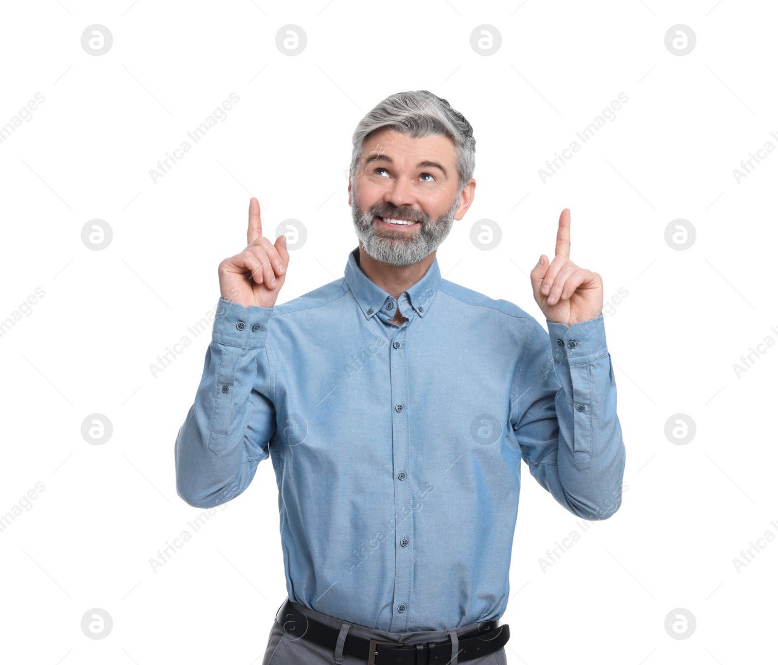 Photo of Mature businessman in stylish clothes posing on white background