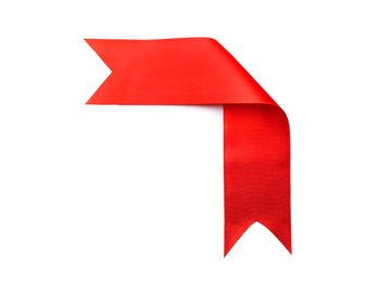 Simple red ribbon on white background, top view. Festive decoration