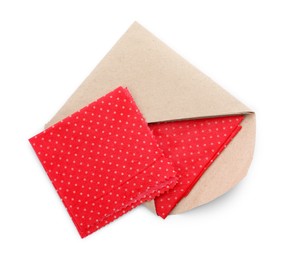 Photo of Red reusable beeswax food wraps on white background, top view