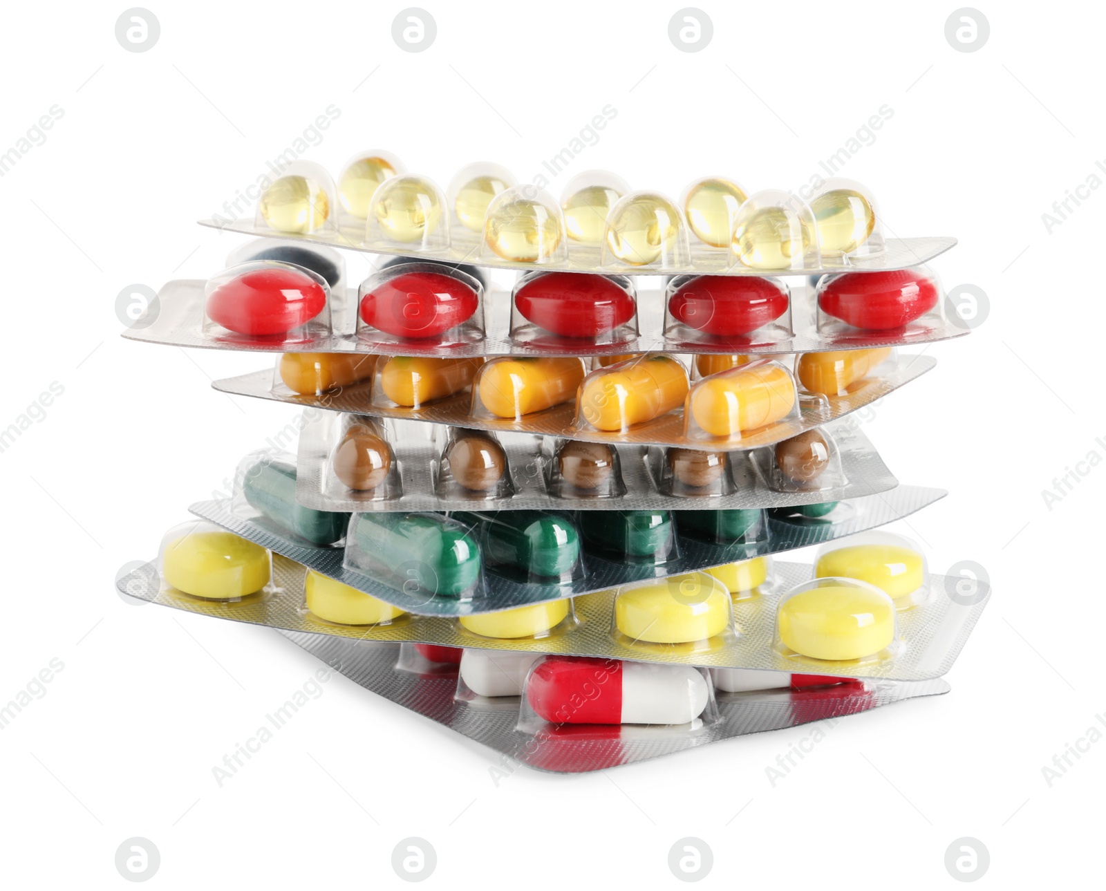 Photo of Stack of blisters with different pills on white background