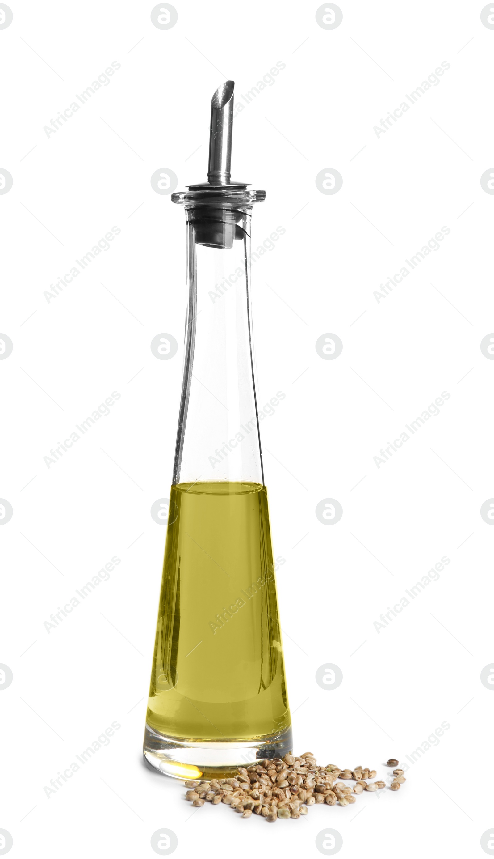 Photo of Bottle with hemp oil and seeds on white background